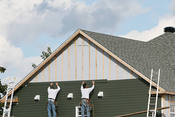 Professional Siding Contractor technician working in Harwick, PA